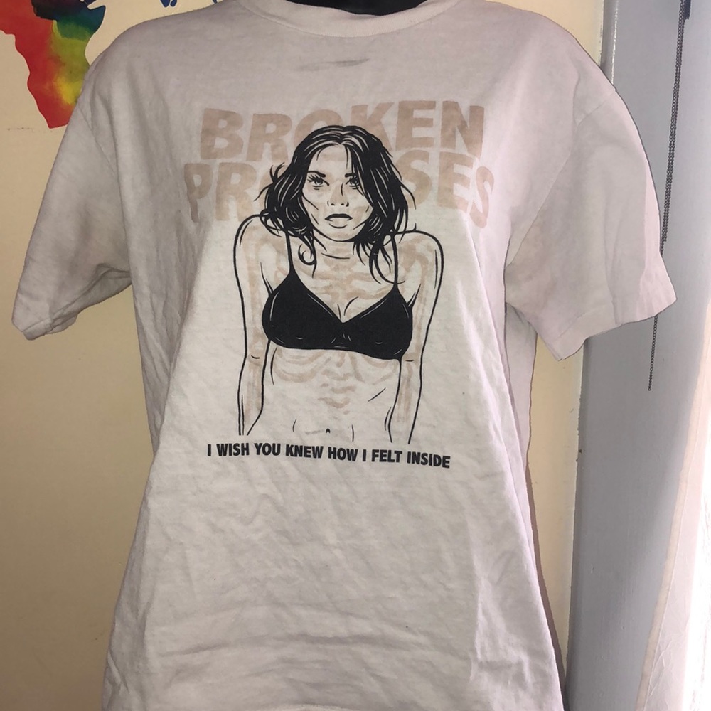 BROKEN PROMISES TEE SHIRT ( turns colors outside )